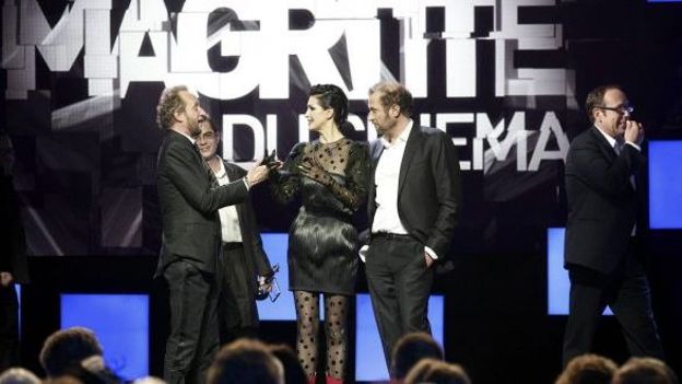 Benoit Poelvoorde (L), Helena Noguerra (C) et François Damiens (R) lors de la 1ère édition des 'Magritte du Cinéma' le 5 février 2011